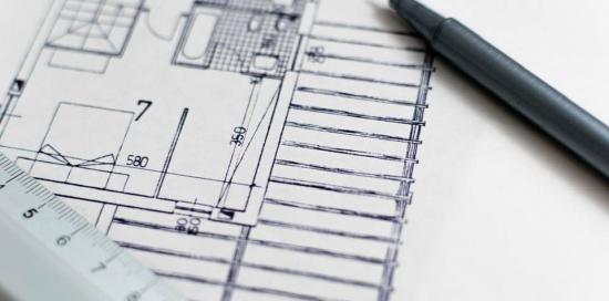 immagine in bianco e nero con progetto di una casa