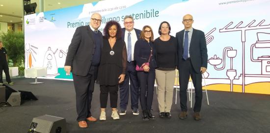 Sul palco di Ecomondo, tra gli altri, l'assessore comunale Matteo Campora e il presidente di Amiu Giovanni Battista Raggi