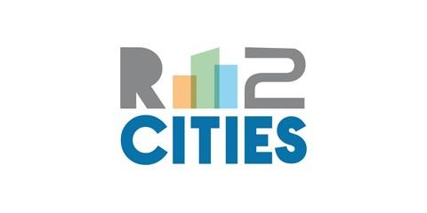 Logo con testo r2 cities e figura di tre palazzi colorati