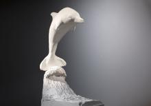 La statuetta di un delfino