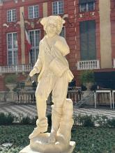 statua