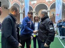 il sindaco bucci con il campione davis 2023 arnaldi