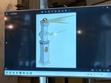 la mascotte (immagine stilizzata della Lanterna con cappellino e spada da scherma