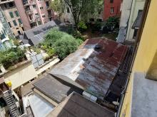 L'area dove ora sorge il cortile di vico Vegetti e su cui insisteva un vecchio fabbricato in condizioni di degrado